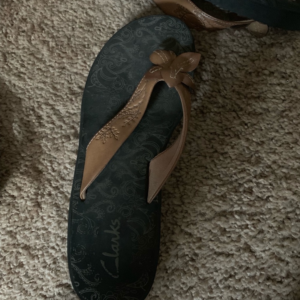 Clark’s flip flops